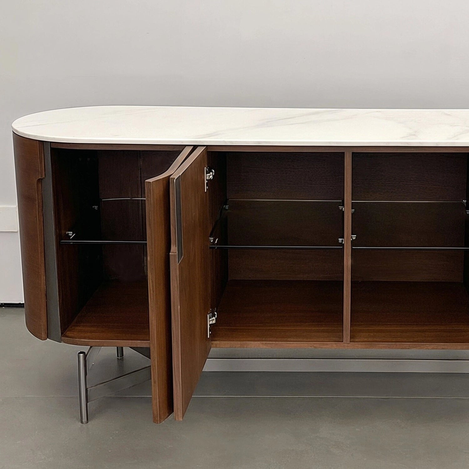 oval_sideboard_open_doors_glass_shelves.jpg Modern luxury oval walnut
