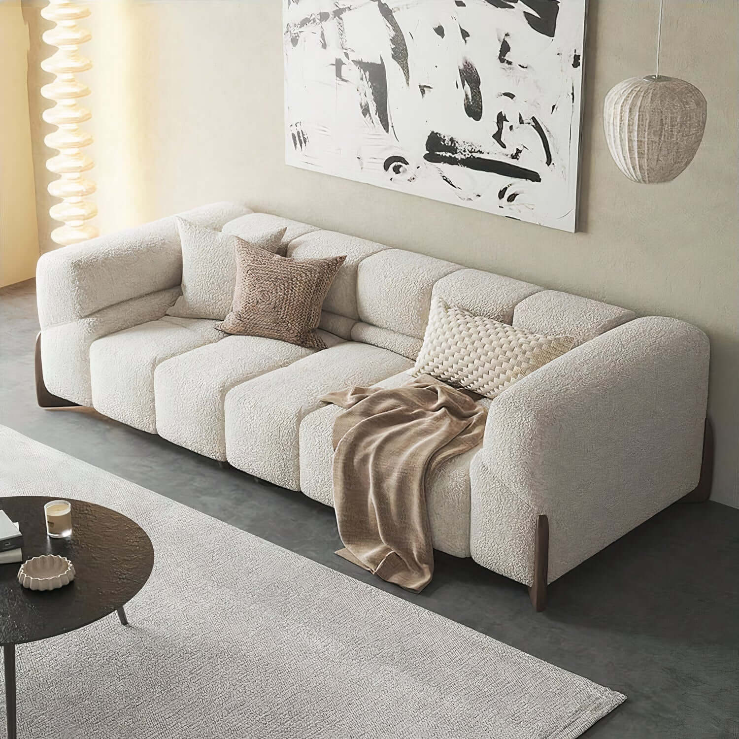 Violet boucle sofa with sleek